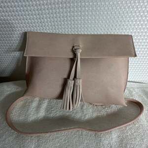 Anthropologie Dreia Envelope Crossbody Bag with Tassel in Blush Pink